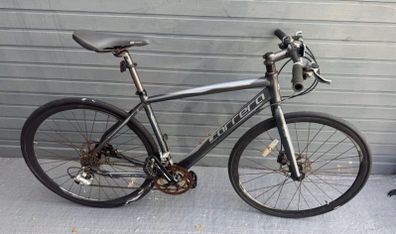 Carrera hybrid flat bar road bike