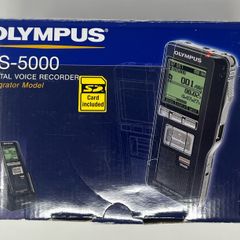 Olympus DS-5000 Digital Voice Recorder with charger unit.