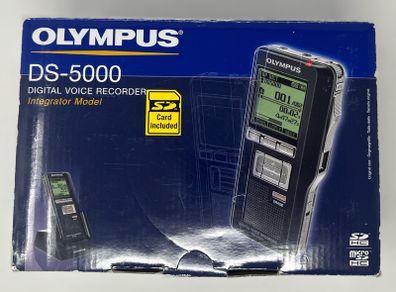 Olympus DS-5000 Digital Voice Recorder with charger unit.