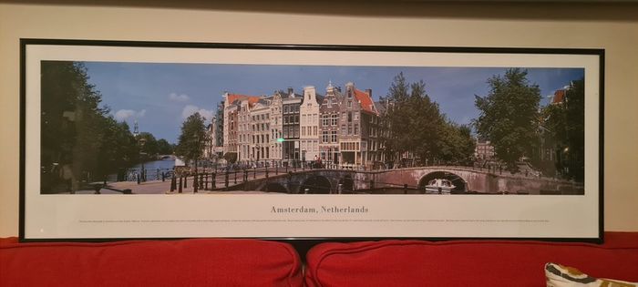 A beautiful black framed panoramic photo of Amsterdam