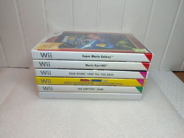 Wii Games The Simpsons Mario kart Super Mario Galaxy Wii Sports Resort Dead rising Mario Sonic Olympics