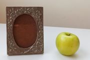 Vintage lead photo frame with flowers relief glazed size  14.5 x 11.5cm