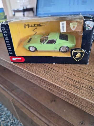 Four vintage boxed diecast models