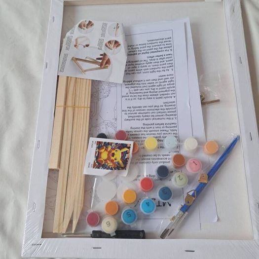 Pokemon pikachu numbers colouring picture comes with mini easel and paints brand new sealed