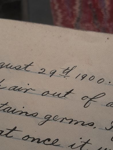 two hand written books