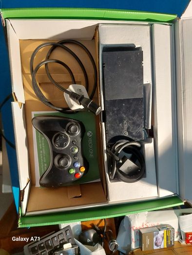 XBOX ONE, Comes in Box with Charger and literature, No Controller, but will include similar controller for XBOX 360, excellent condition