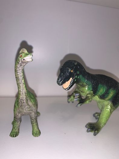 Three dinosaur toys