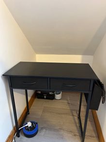 Black desk with 2 drawers and side pocket storage