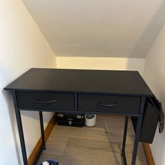 Black desk with 2 drawers and side pocket storage