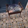 Antique piano stool upholstered in peacock fabric Image 8