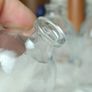 481 - Set of 3 Vintage Clear Glass Cork Top Collectible Decorative Injection Bottles Image 4