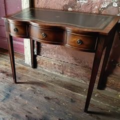 A Shereton serpentine Writing Desk