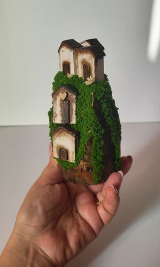 Handcrafted wooden houses on logs!