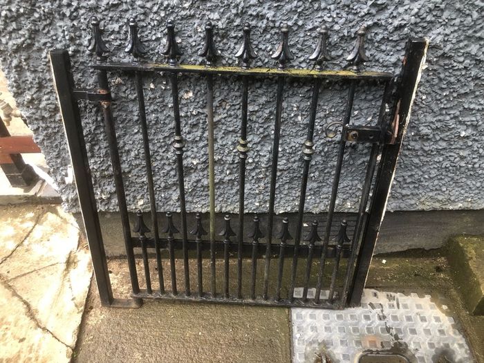 Set of wrought iron driveway gates and side gate