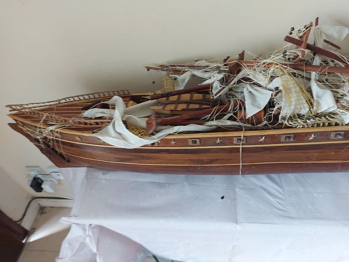 Large Timber  crafted model of the Cutty Sark, A speedy Clipper Sailboat that transported TEA in the late 19thy century