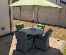 4 Seat Rattan Garden Dining Set. 1.2m Table Cushions and Parasol