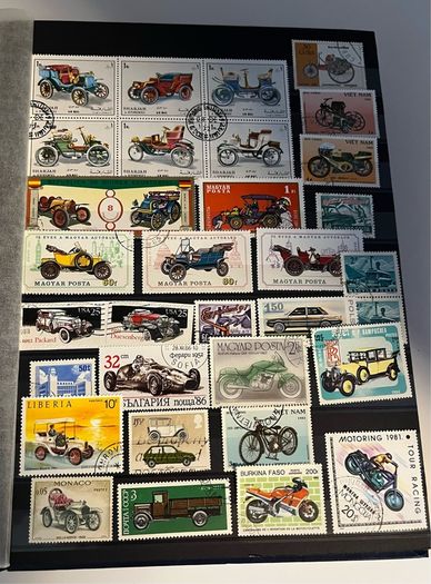 Ace Black 32 page/ 16 leaf Stamp Album with over 900 stamps. Thematic of Animals, Plants, Classic Cars, Space, Trains, Sport & Disney noted.