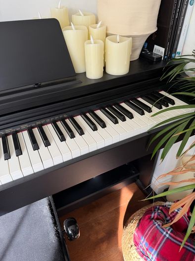 Electric piano Casio Celviano AP270 with adjustable stool