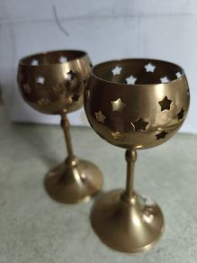 Vintage Pair of Brass Heart Candle Holders, Bronze goblet candle holder adorned with star-shaped cutouts,