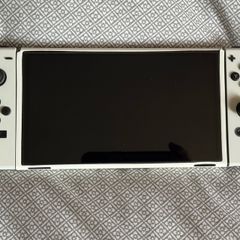 Switch OLED in nearly new All-white joy-cons and console