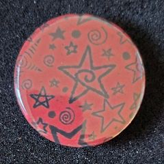 Star, pin back button badge.