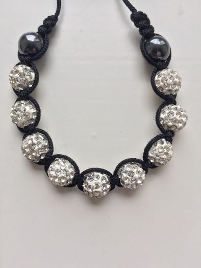 White & black beaded bracelet with diamonds
