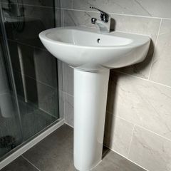 basin with pedestal and tap