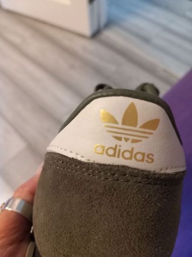 addias kaki runners in excellent condition worn once