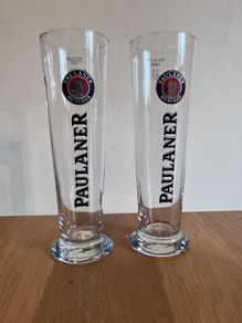 Two Paulaner pint glasses