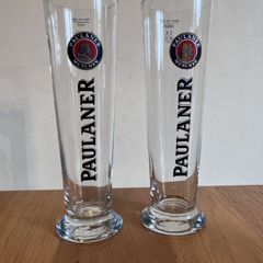 Two Paulaner pint glasses