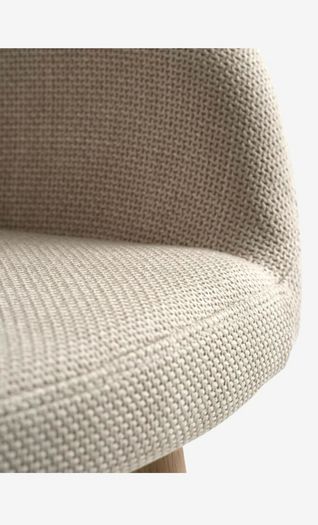 4 beige dining chairs and 2 counter stools