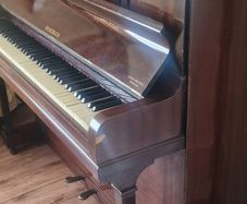Vintage Rosebuck Upright Piano