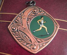Vintage Art Deco Style Running Medal Pendant For Sale