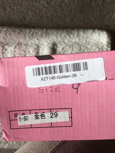 . Brand new in box , pair of girls gold shoes