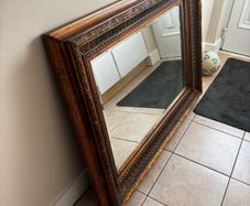 Large ornate wooden mirror