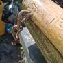 This Antique 19th Century Wooden Single Tree used to connect a Horse or Ox to Farm Equipment. The item features handmade wooden construction with blacksmith-forged iron hook Stage or Movie Props Image 4
