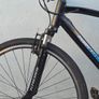 Two bikes one mountain one is a type of racing mountain bike Image 6