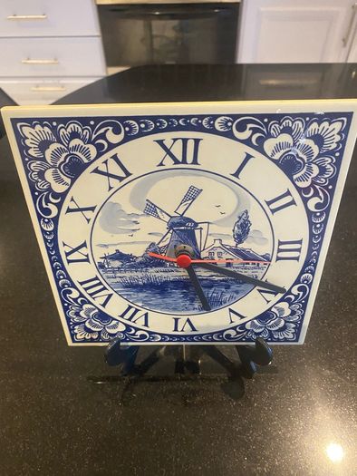 Blue tile clock with windmill