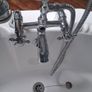Corner bath with Panelling and Avondale Taps Image 10