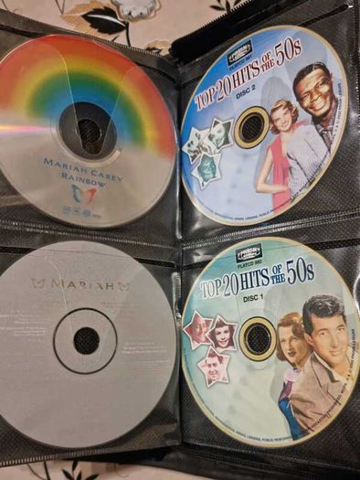 80 CD + Case. All CD's in perfect playable condition.