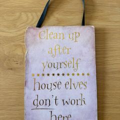 Harry Potter sign "Clean up after yourself, house elves don't work here"