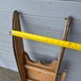 These are vintage wooden snow sleds Image 10