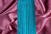 Vintage 1980s turquoise blue pleated midi length skirt. Made in Ireland by Michel Ambers, size 12.