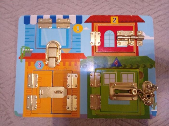 Melissa and Doug Latches Board