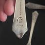 Collection of 11 Vintage Newbridge Silverware Celtic Dragon Design Spoons from Jurys Hotel Image 5