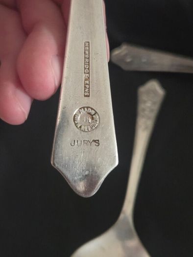 Collection of 11 Vintage Newbridge Silverware Celtic Dragon Design Spoons from Jurys Hotel
