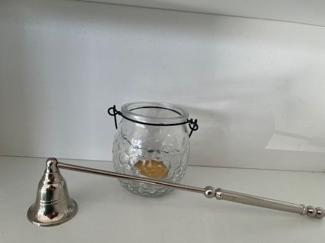 Metal Handle Candle Snuffer. Silver Finish. Moveable Head. With Hanging Tea Light. In Excellent Condition.