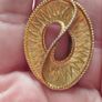 Vintage gold tone brooch. Image 5
