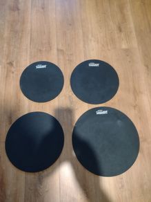 Set of Evans drum mufflers.