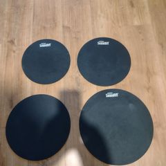 Set of Evans drum mufflers.